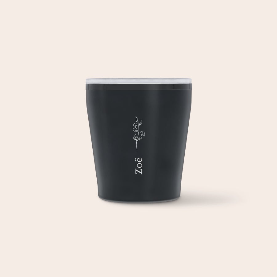 Engraved travel mug Black personalized travel mug with the name Zoë and a floral design printed in white