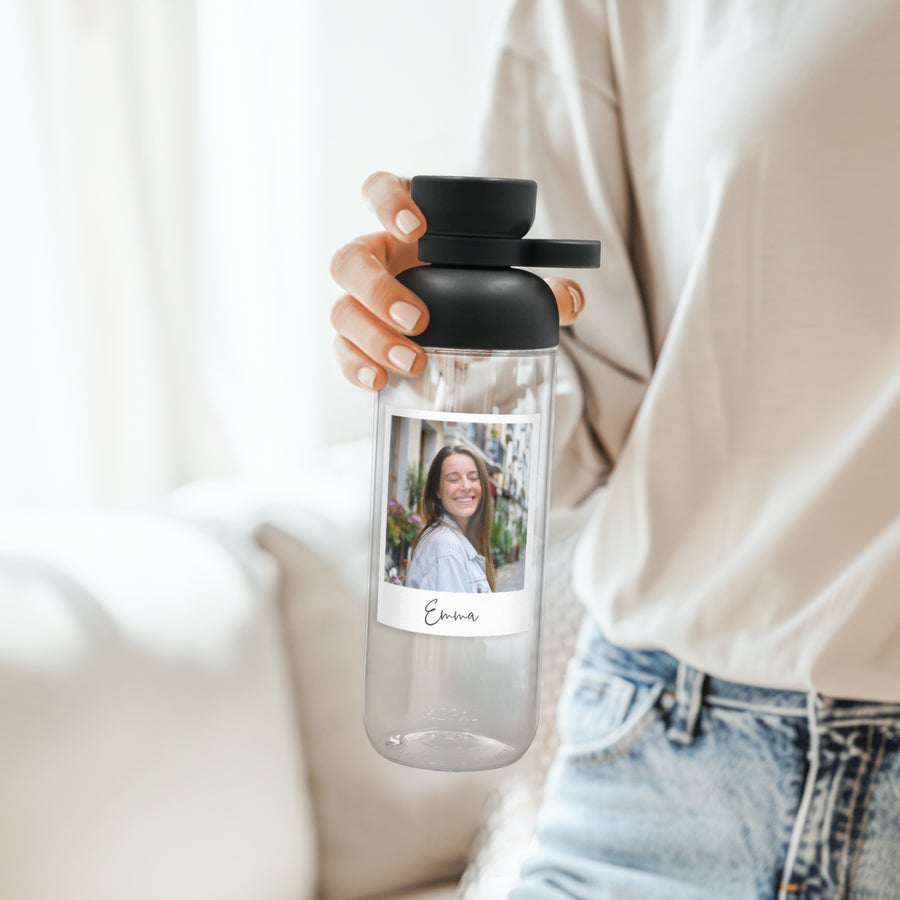 Clear Mepal water bottle with a photo of a smiling woman and the name Emma printed on it.