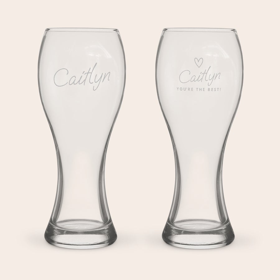 Two personalized xl beer glasses, one engraved with Caitlyn, the other with a heart Caitlyn You're the Best