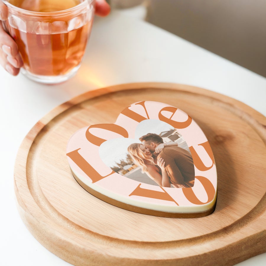 Personalised chocolate heart Personalized chocolate heart printed with a photo of a couple and the word LOVE in orange