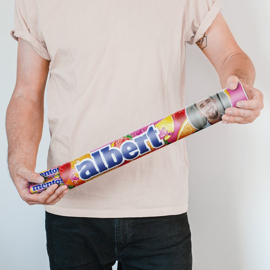 Personalised XXL Mentos Roll Person holding a personalized XXL Mentos roll printed with the name "Albert" and a photo