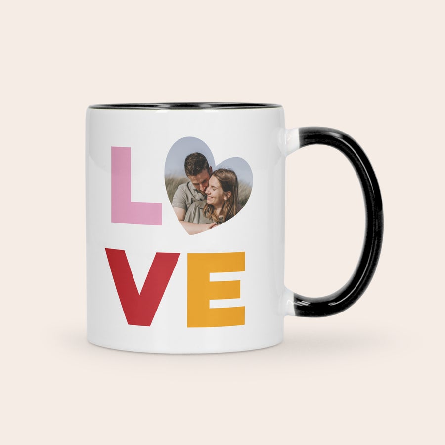 Custom Color Mug A white and black personalized coloured mug with a photo and the word LOVE printed on it as a gift