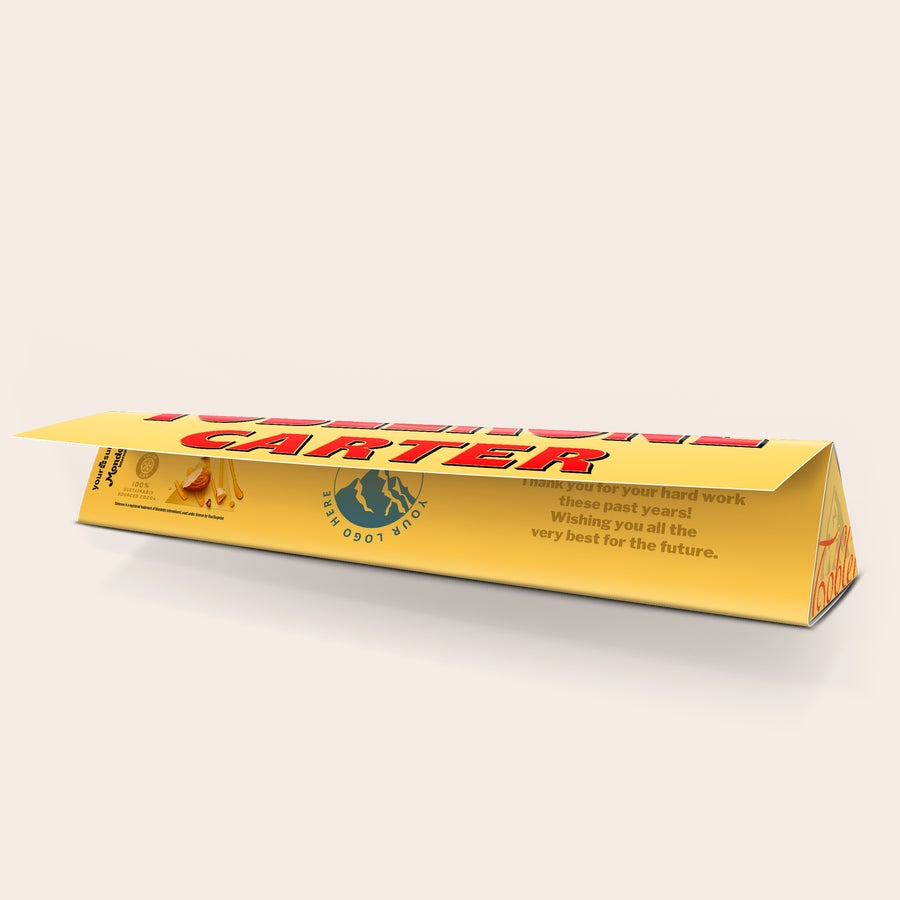 Personalised Toblerone Chocolate Bar A personalized Large Toblerone bar with the name CARTER and a thank you message printed on the wrapper