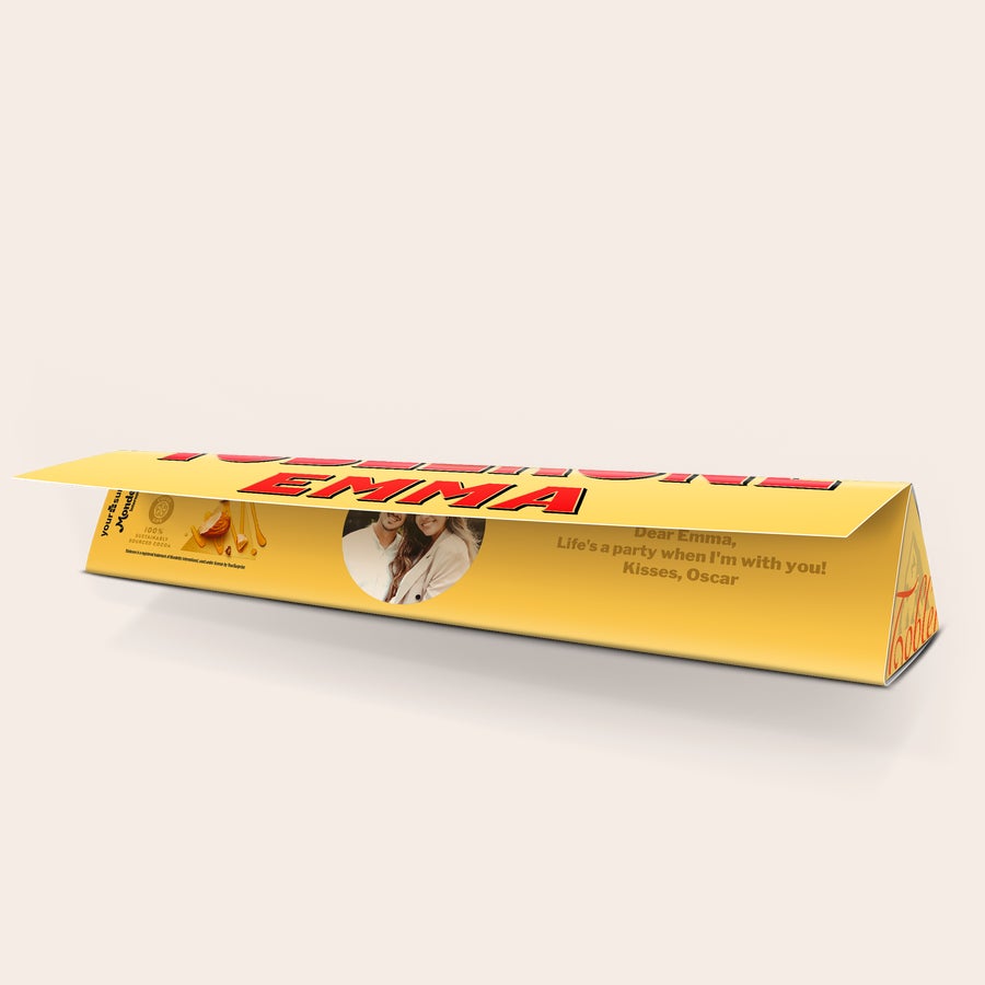 Large Toblerone bar with a personalized wrapper, printed with a photo and the name Emma