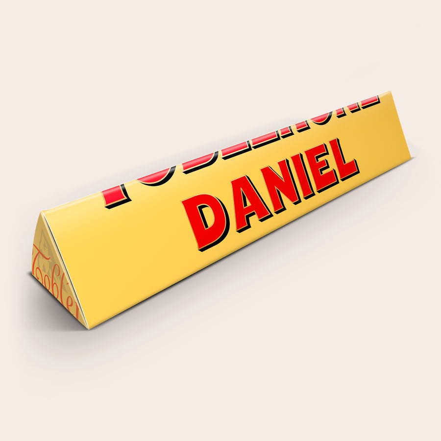 Large personalized Toblerone bar printed with the name Daniel in red