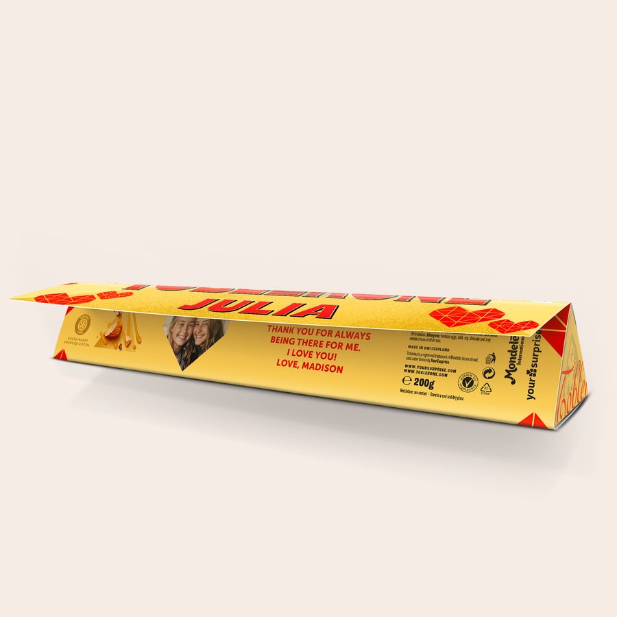Personalised Toblerone Chocolate Bar - Love Delicious Toblerone bar with a custom wrapper printed with the name Julia, a photo, and a message.