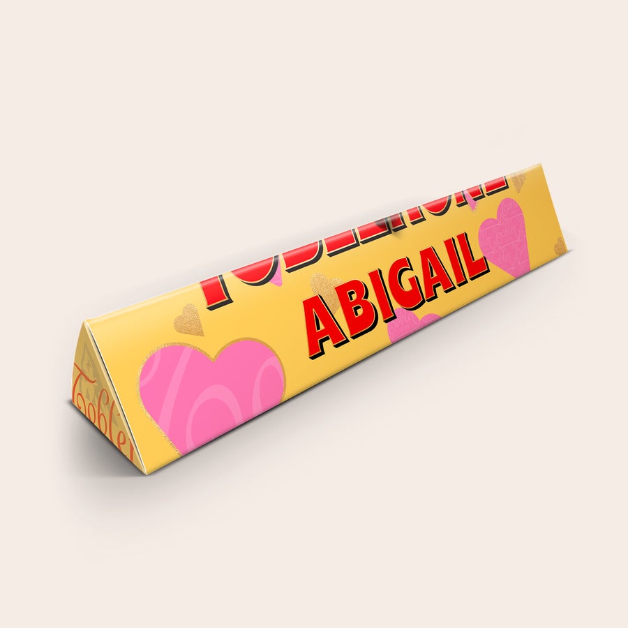Personalised Toblerone Chocolate Bar - Love Personalized Toblerone bar with a name and photo, Abigail printed on the wrapper with pink and gold hearts
